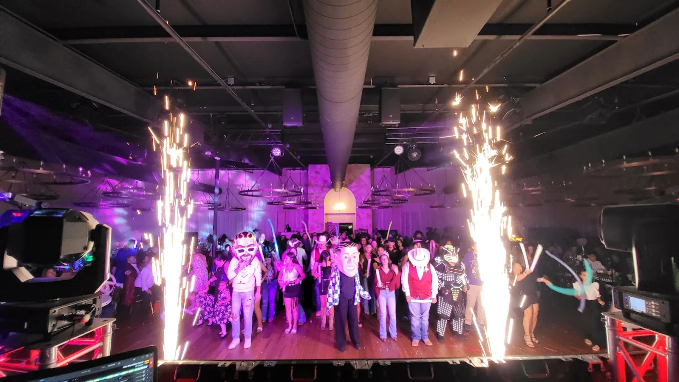 Guests celebrating together on the dance floor